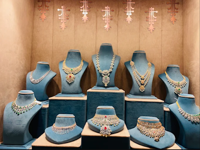 Gold and diamond jewellery displayed inside Bombay Jewellers